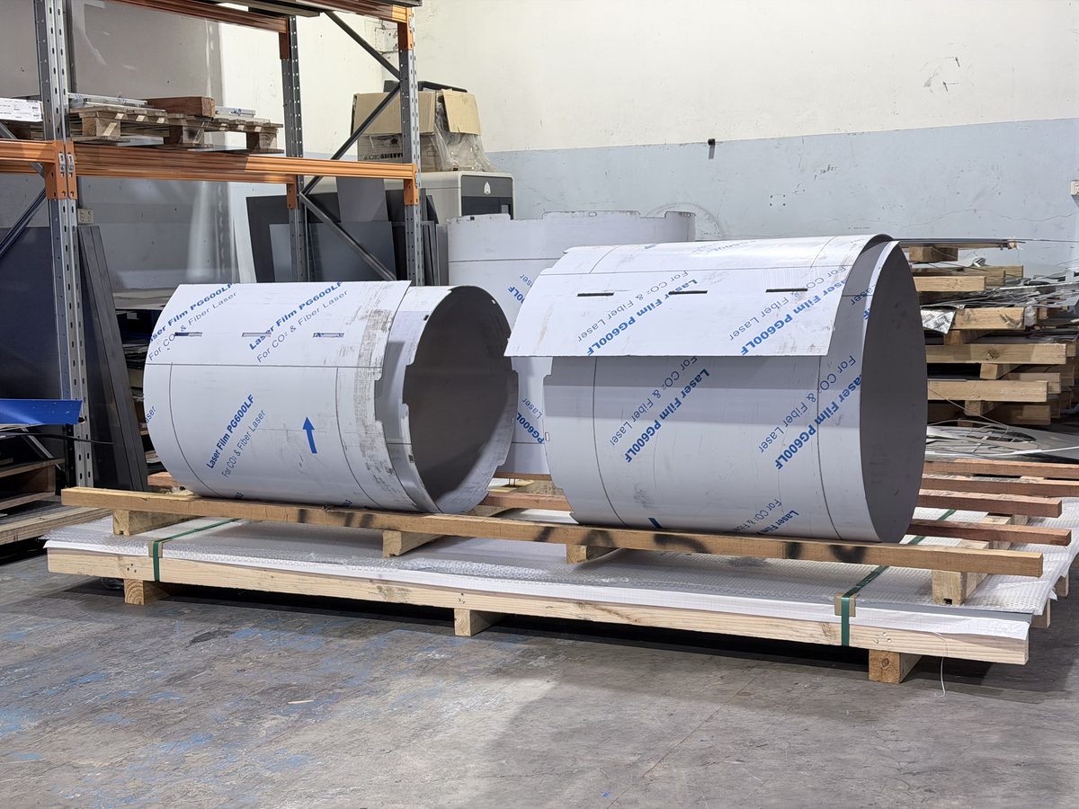 Large aluminium cylindrical fabrications ready for delivery — Aston Precision Melbourne